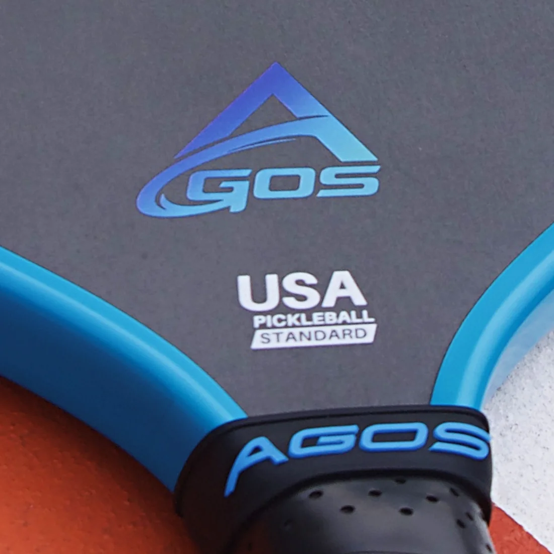 The USA PICKLEBALL STANDARD mark printed on the face beside the AGOS logo